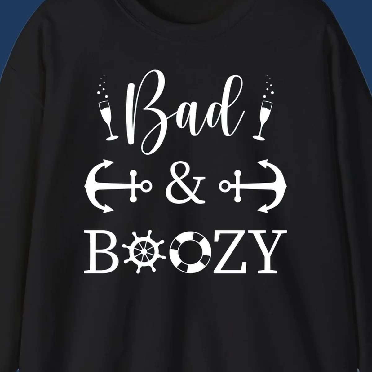 Bad and Bozy nautical cruise design with champagne flutes, ship anchors, arrows, ship wheel and life preserver on gray background
