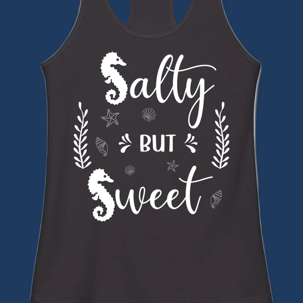 Salty but sweet nautical design with seahorses, starfish, and seashells in white on gray background