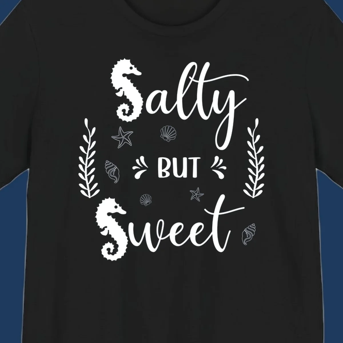 Salty but sweet nautical design with seahorses, starfish, and seashells in white on gray background