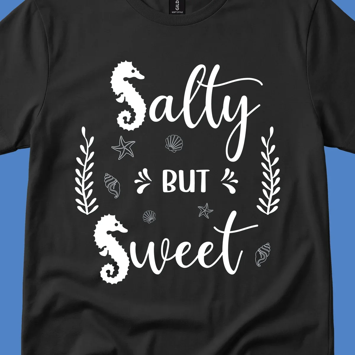 Salty but sweet nautical design with seahorses, starfish, and seashells in white on gray background