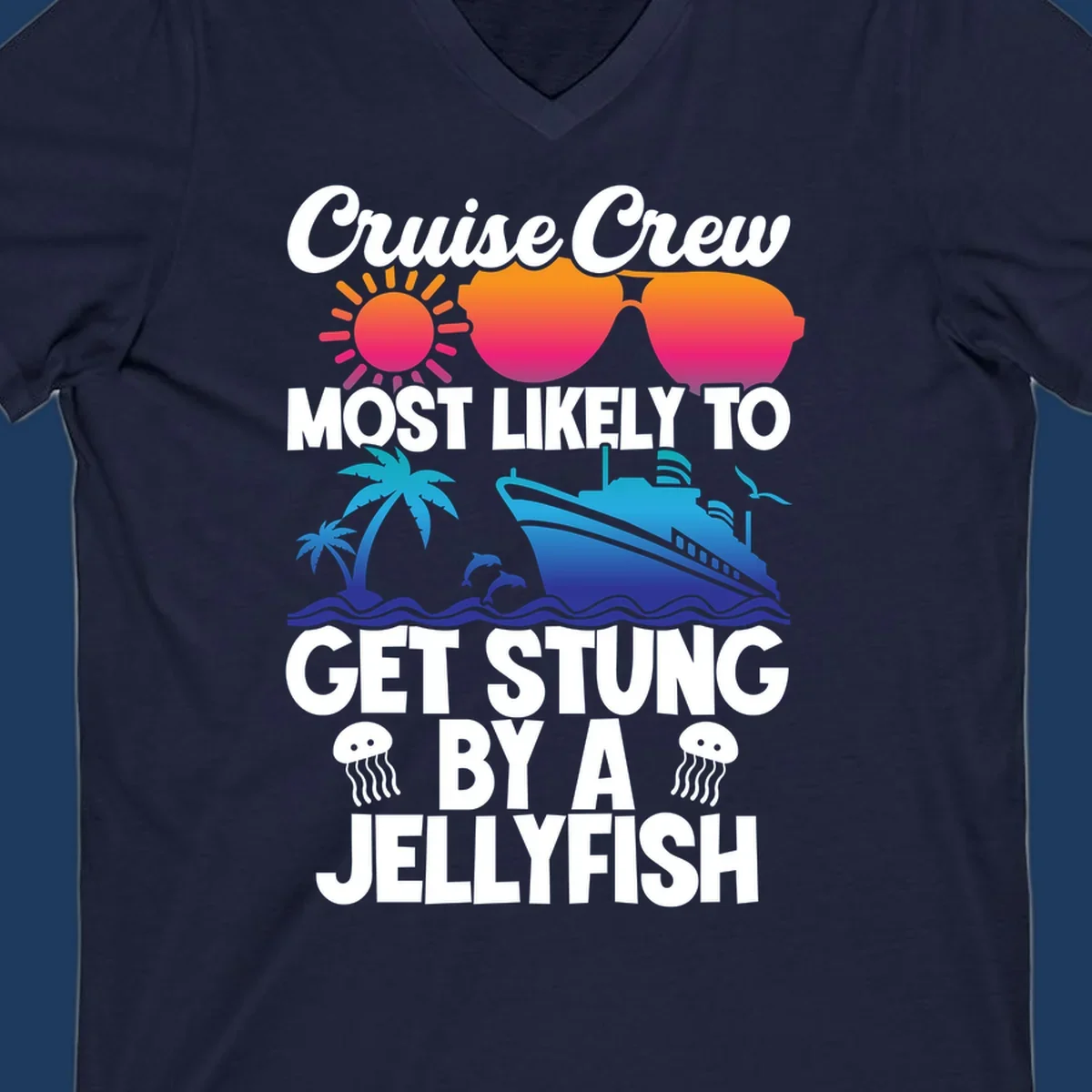 Colorful cruise design with sun, ship, dolphins, and jellyfish. Text reads 'Cruise Crew Most Likely To Get Stung By A Jellyfish'