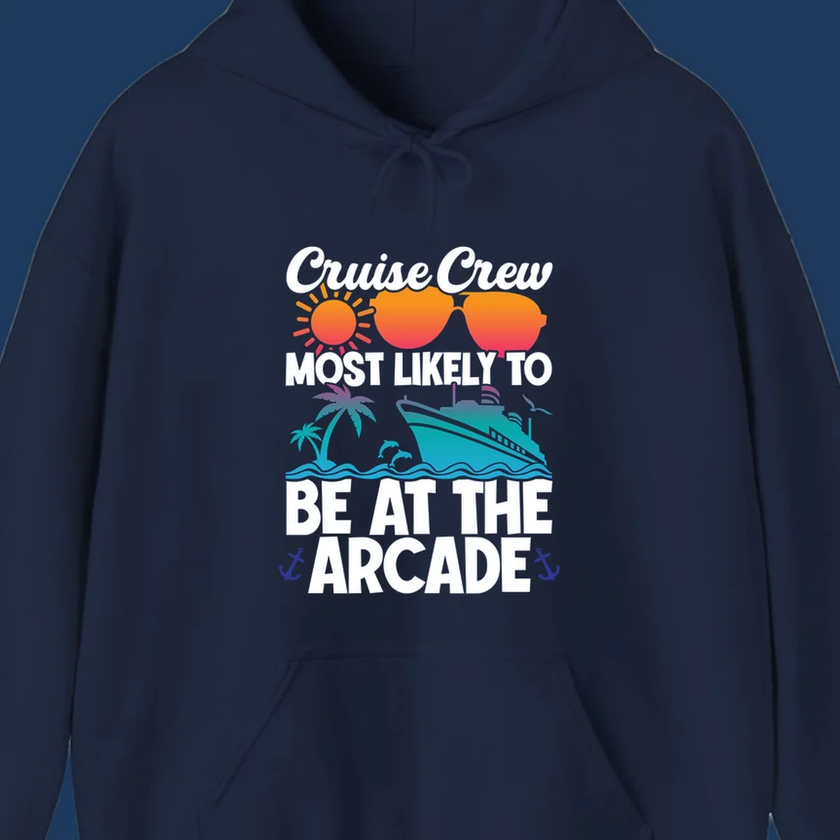 Colorful cruise-themed design with sun, sunglasses, palm tree, ship and waves. Text reads 'Cruise Crew Most Likely To Be At The Arcade' in white letters with gradient orange to teal colors and anchor accents.