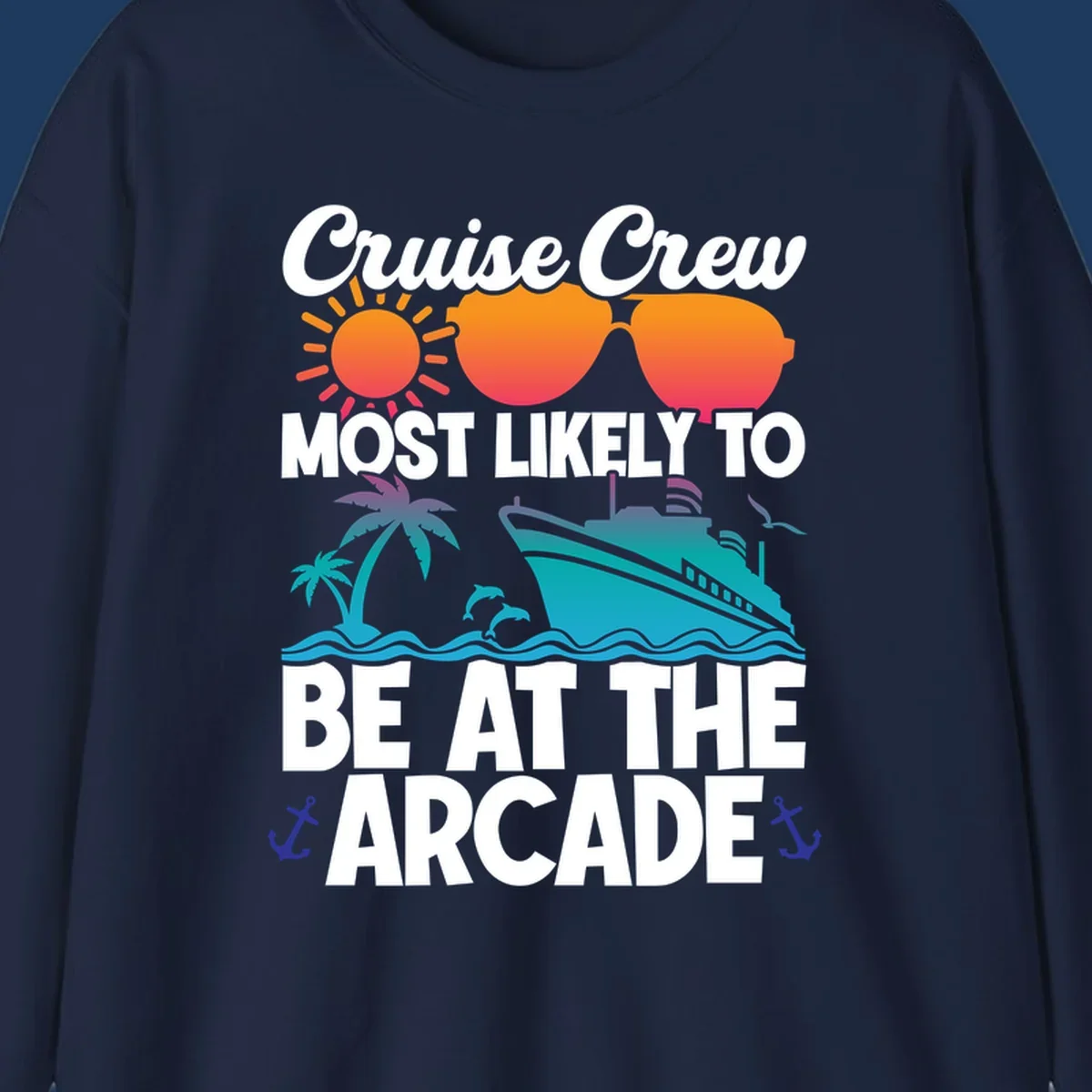 Colorful cruise-themed design with sun, sunglasses, palm tree, ship and waves. Text reads 'Cruise Crew Most Likely To Be At The Arcade' in white letters with gradient orange to teal colors and anchor accents.