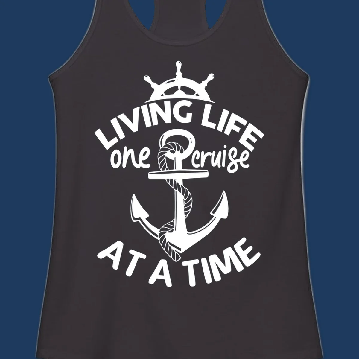 White nautical design with ship's wheel, anchor and rope on gray background with text living life one cruise at a time
