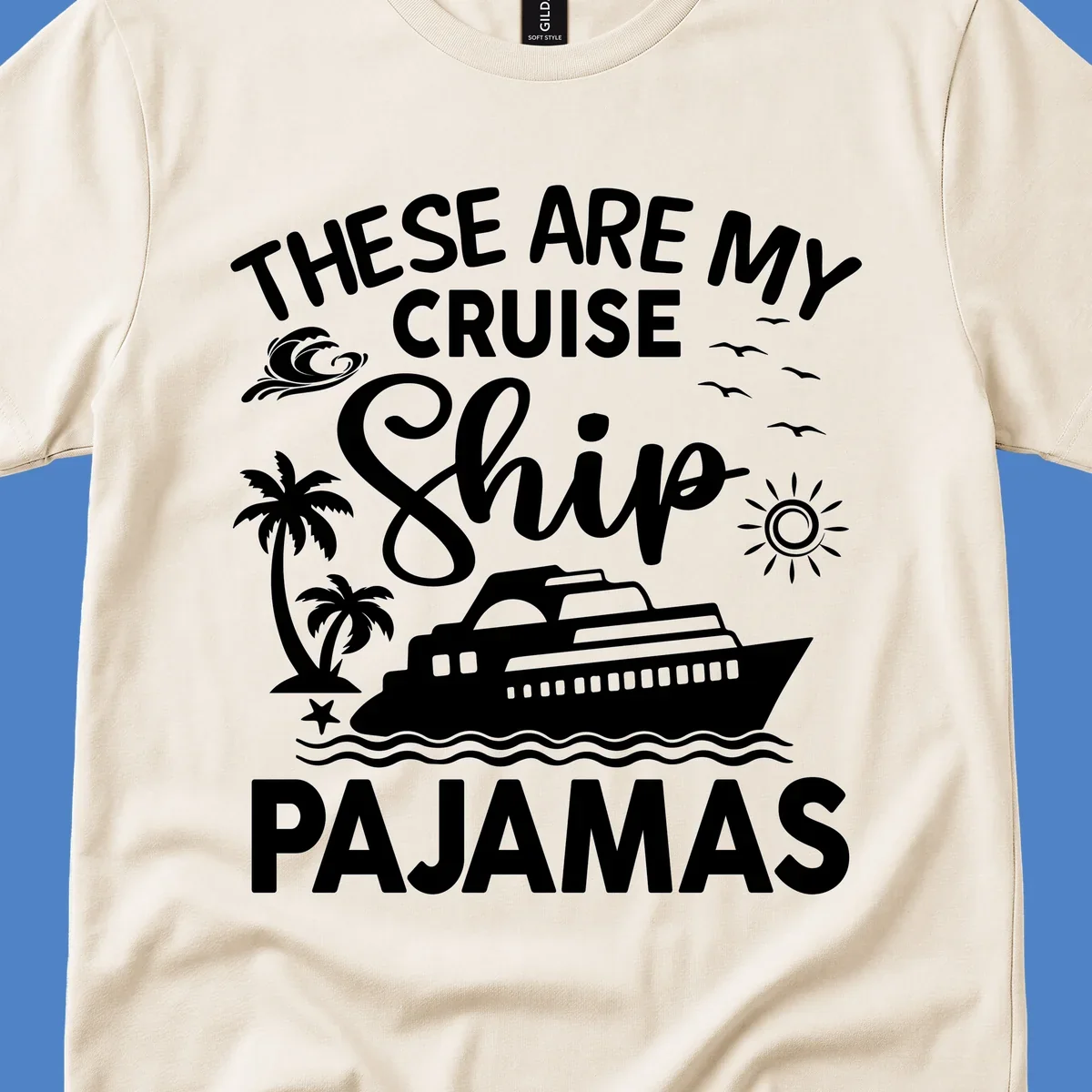 Cruise ship pajamas design with illustrated ship, palm trees, waves, sun and seagulls with text saying 'These Are My Cruise Ship Pajamas'