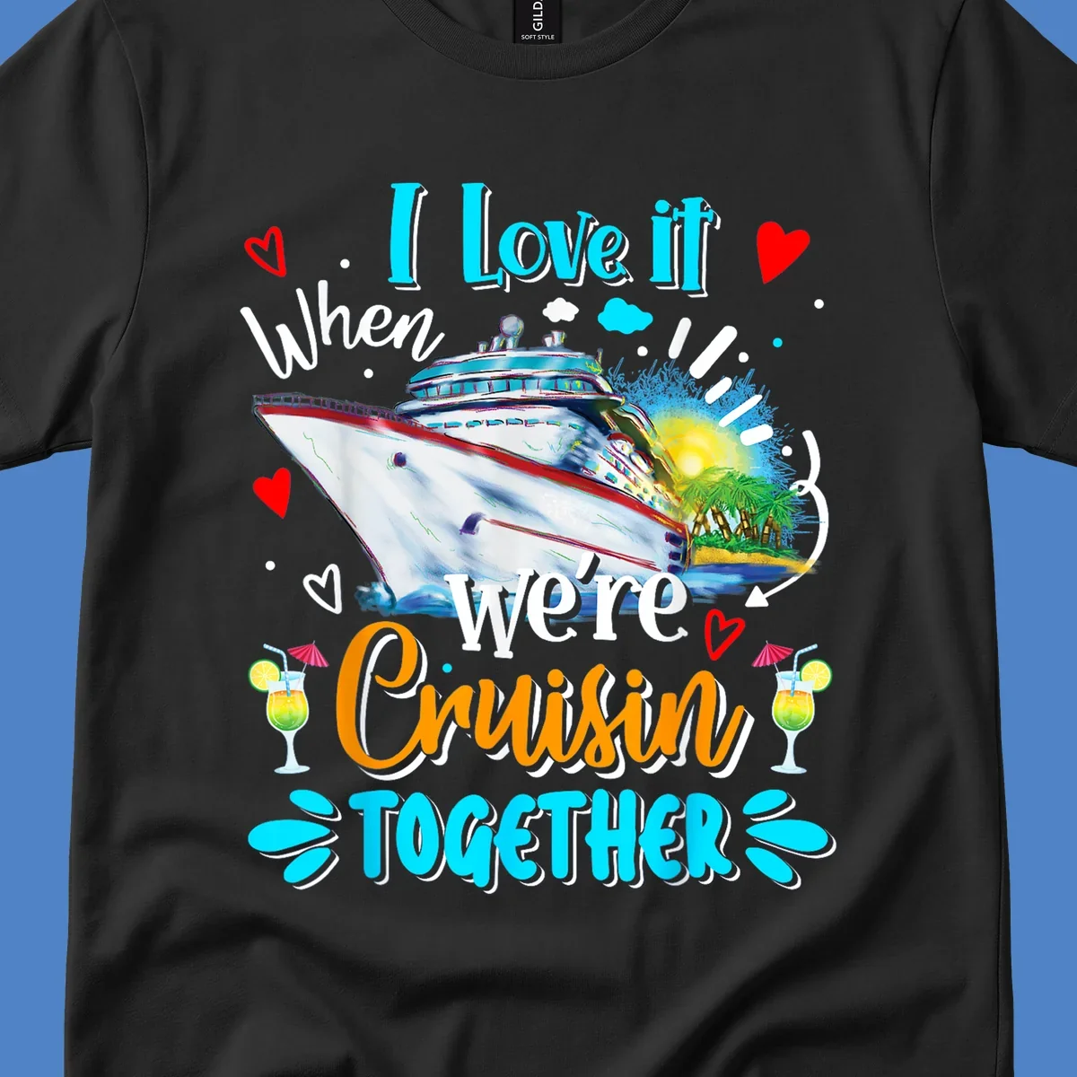 Colorful cruise ship with tropical island, hearts, and cocktails. Text reads 'I love it when we're Cruising Together' in cyan and orange lettering on gray background.