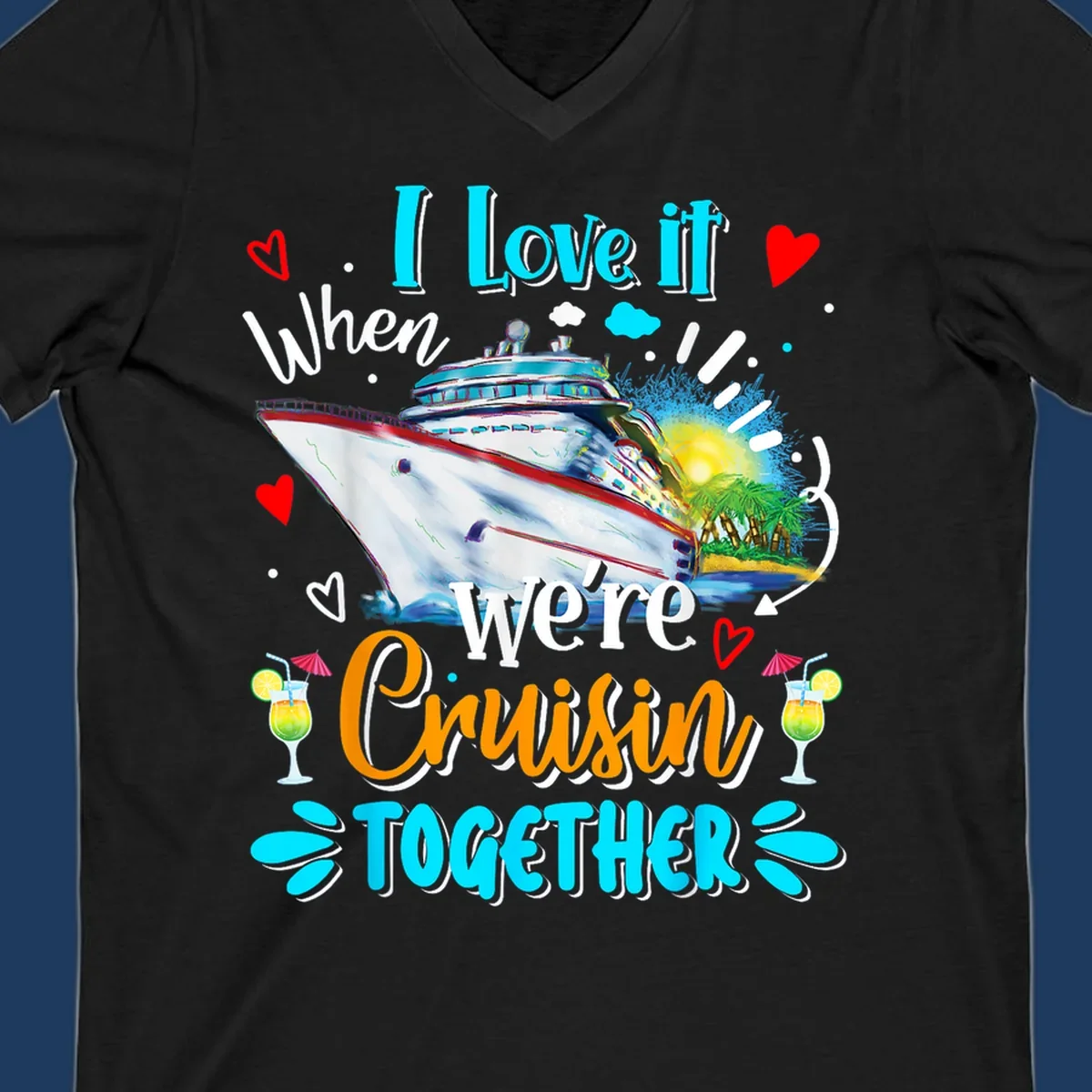 Colorful cruise ship with tropical island, hearts, and cocktails. Text reads 'I love it when we're Cruising Together' in cyan and orange lettering on gray background.