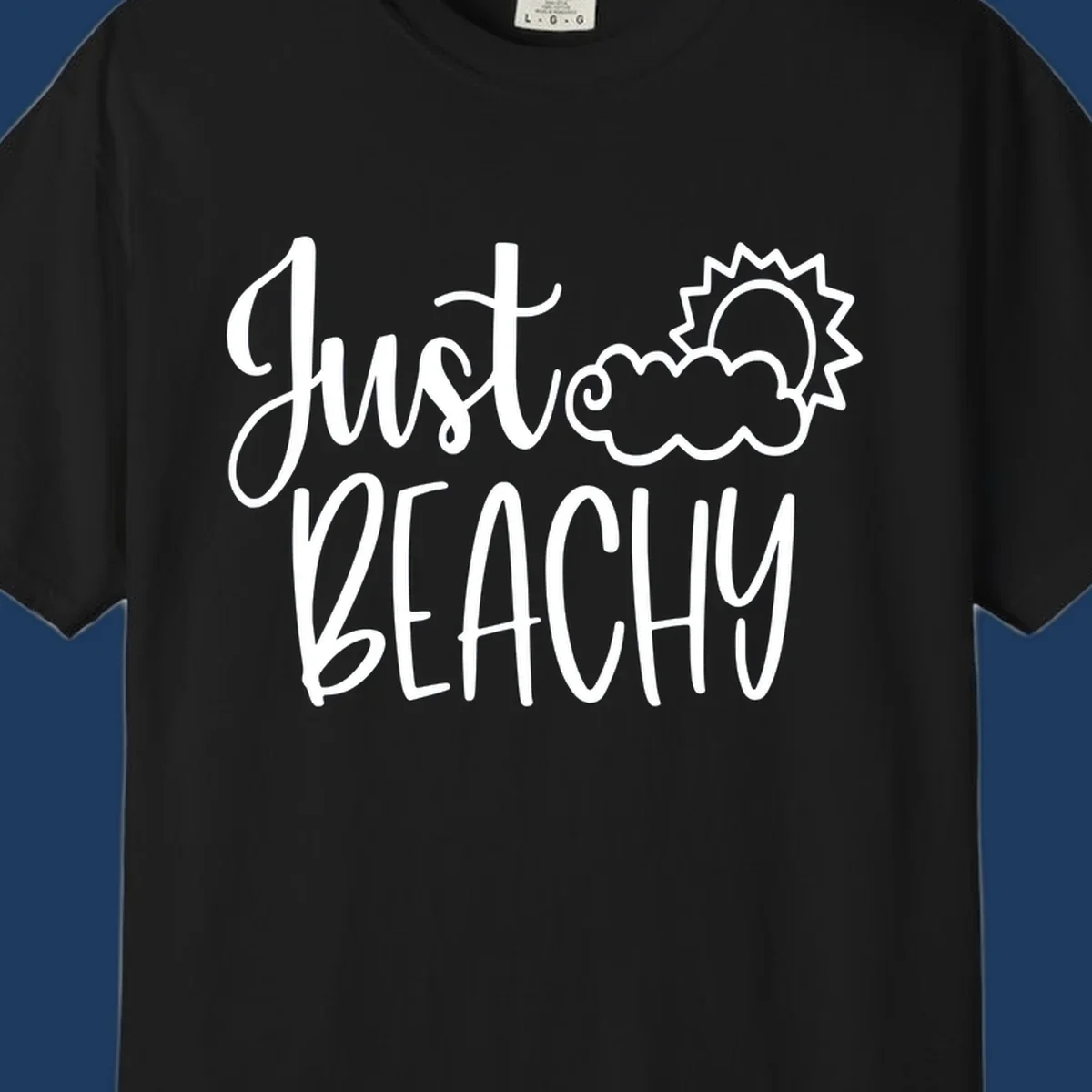 White illustrated text reading 'Just Beachy' with a smiling sun and cloud graphic, capturing beach vacation vibes