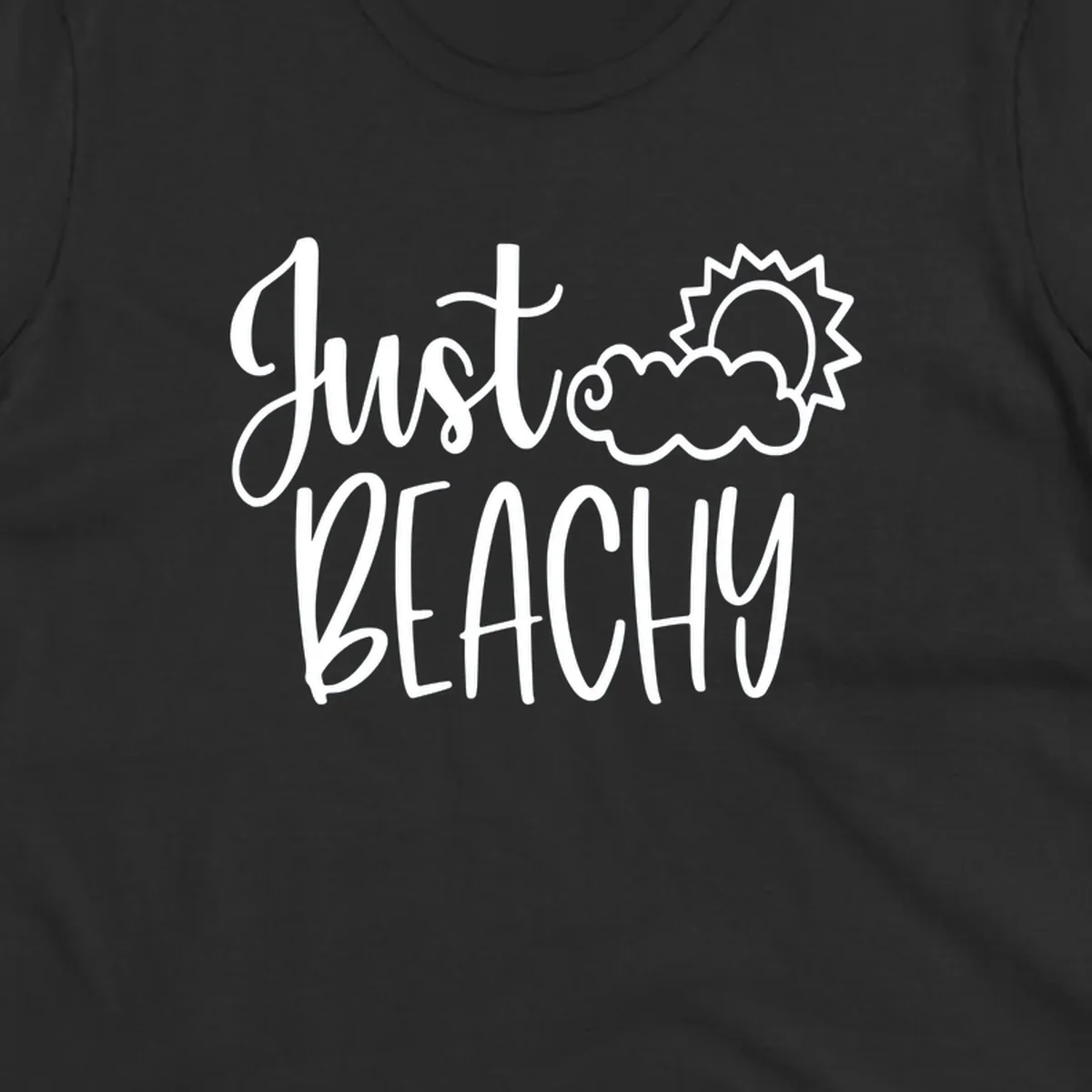 White illustrated text reading 'Just Beachy' with a smiling sun and cloud graphic, capturing beach vacation vibes