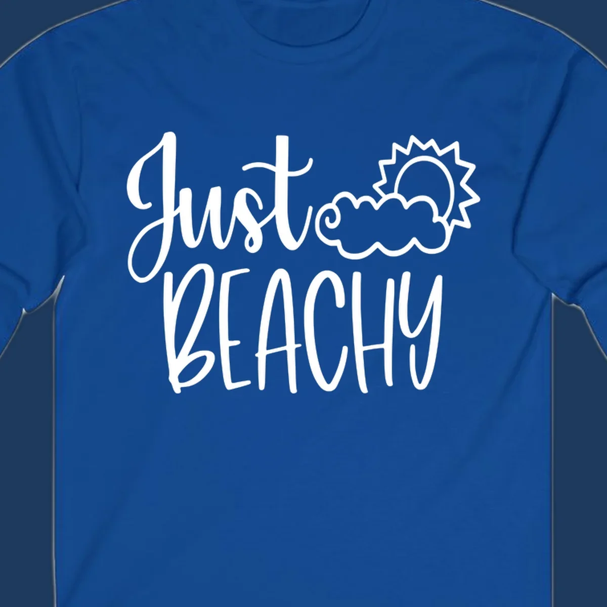 White illustrated text reading 'Just Beachy' with a smiling sun and cloud graphic, capturing beach vacation vibes