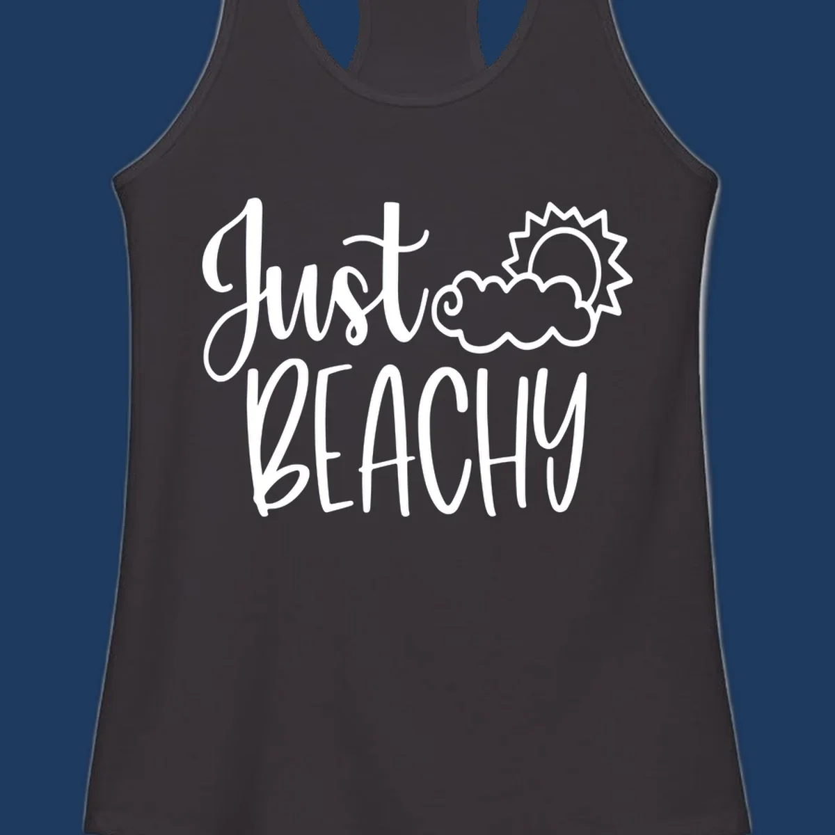 White illustrated text reading 'Just Beachy' with a smiling sun and cloud graphic, capturing beach vacation vibes