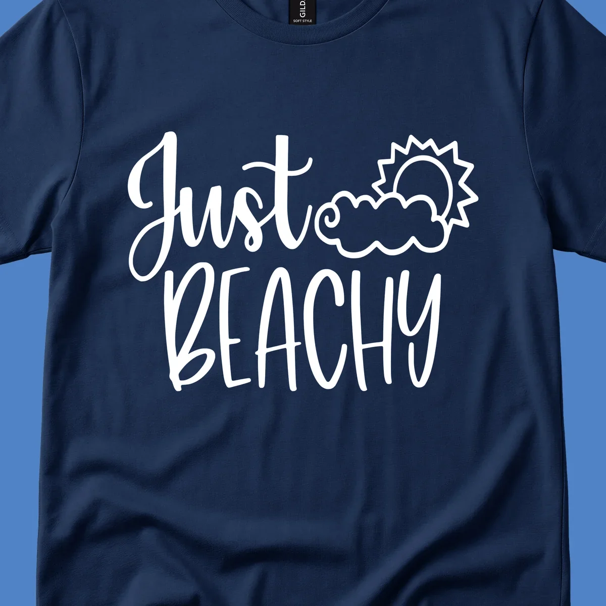 White illustrated text reading 'Just Beachy' with a smiling sun and cloud graphic, capturing beach vacation vibes