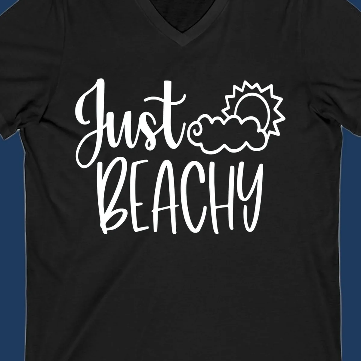 White illustrated text reading 'Just Beachy' with a smiling sun and cloud graphic, capturing beach vacation vibes