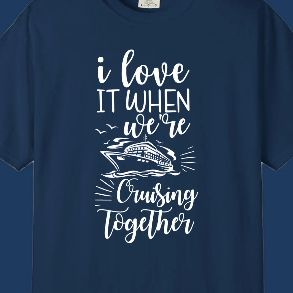 White script text reading 'i love it when we're cruising together' with an illustration of a cruise ship on ocean waves and seagulls