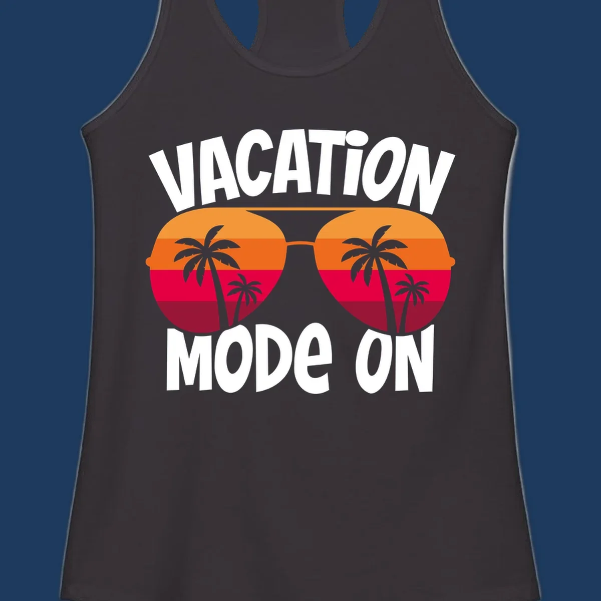 Vacation mode on design featuring oversized sunglasses with tropical sunset and palm trees inside each lens, framed by bold white text