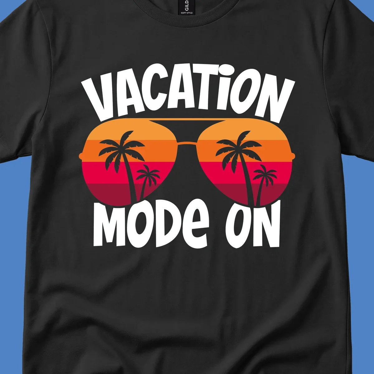 Vacation mode on design featuring oversized sunglasses with tropical sunset and palm trees inside each lens, framed by bold white text