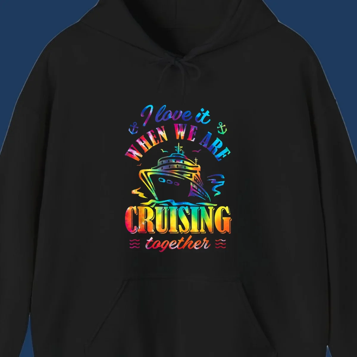 Colorful cruise ship design with 'I love it when we're cruising together' text, anchors, and waves on gray background