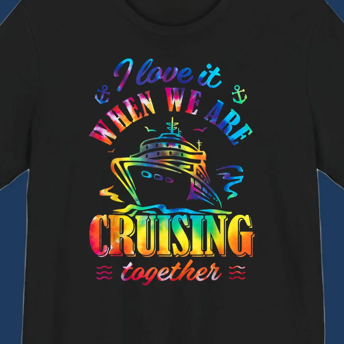 Colorful cruise ship design with 'I love it when we're cruising together' text, anchors, and waves on gray background