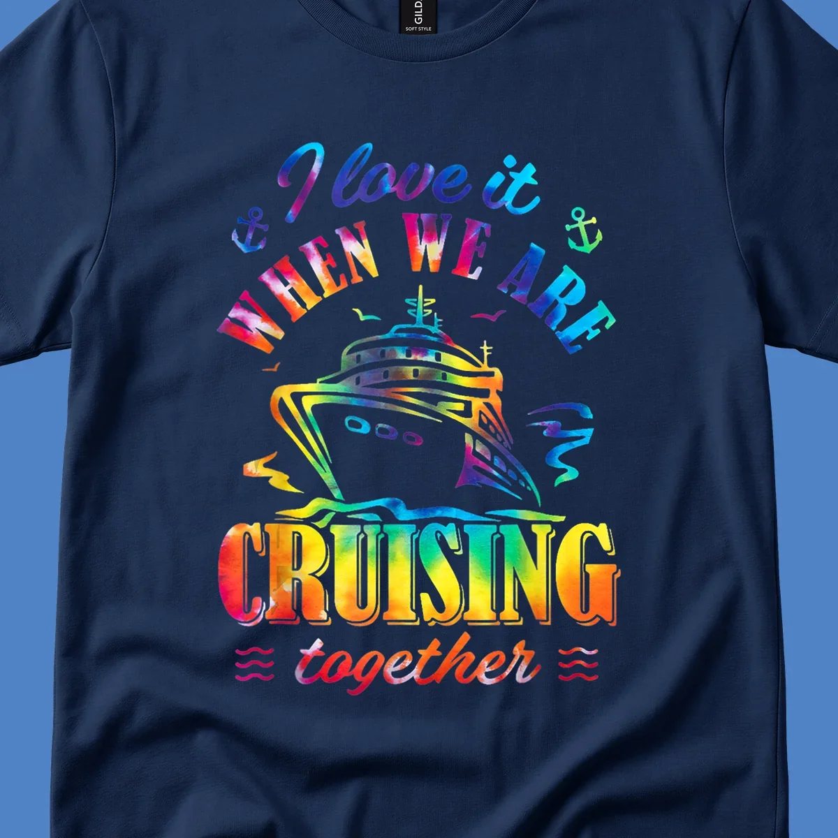 Colorful cruise ship design with 'I love it when we're cruising together' text, anchors, and waves on gray background