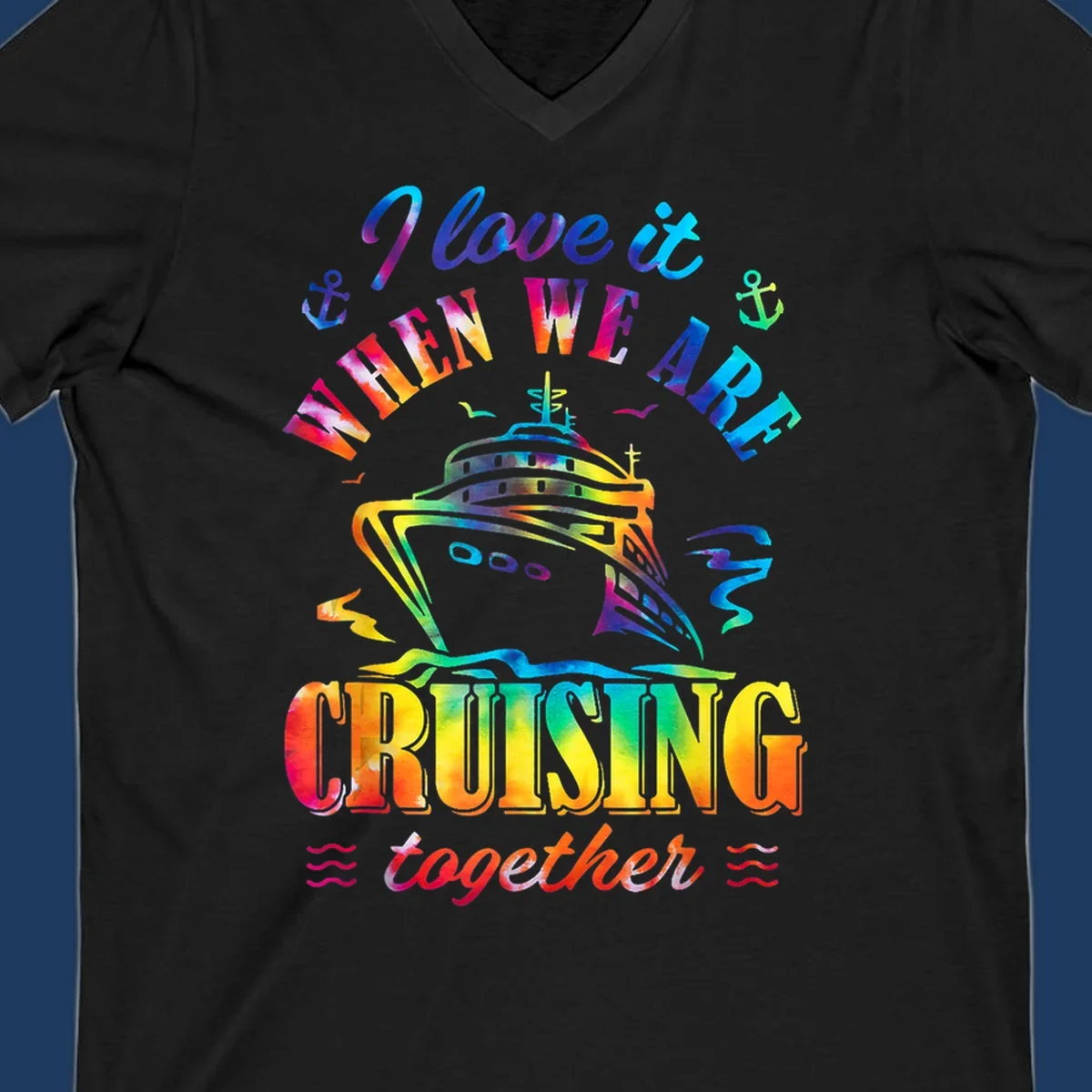 Colorful cruise ship design with 'I love it when we're cruising together' text, anchors, and waves on gray background