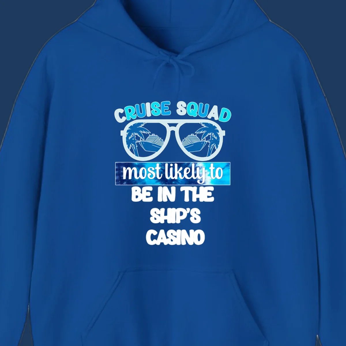 Sunglasses with cruise ship and palm tree reflections, 'Cruise Squad most likely to be in the ship's casino' text design