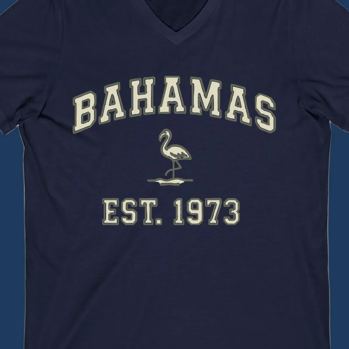 Vintage bahamas flamingo design with cream lettering and olive green outline, established 1973 theme