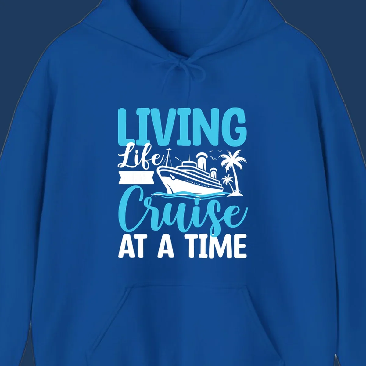 Cyan and white cruise ship design with 'Living Life Cruise At A Time' text, palm trees, and ocean waves on gray background