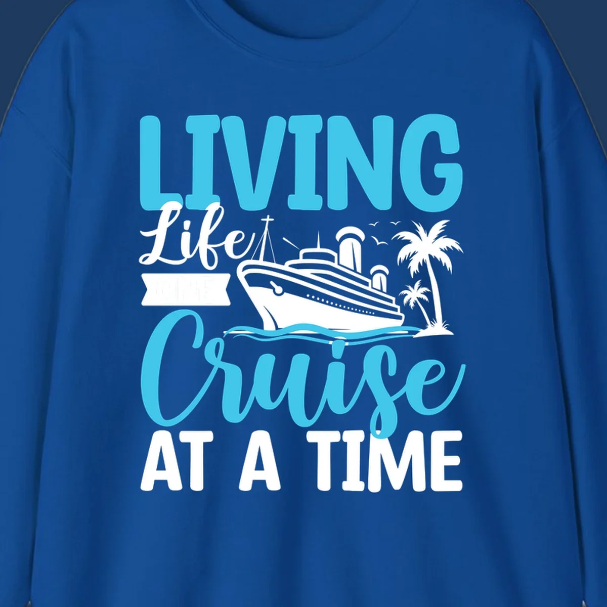 Cyan and white cruise ship design with 'Living Life Cruise At A Time' text, palm trees, and ocean waves on gray background