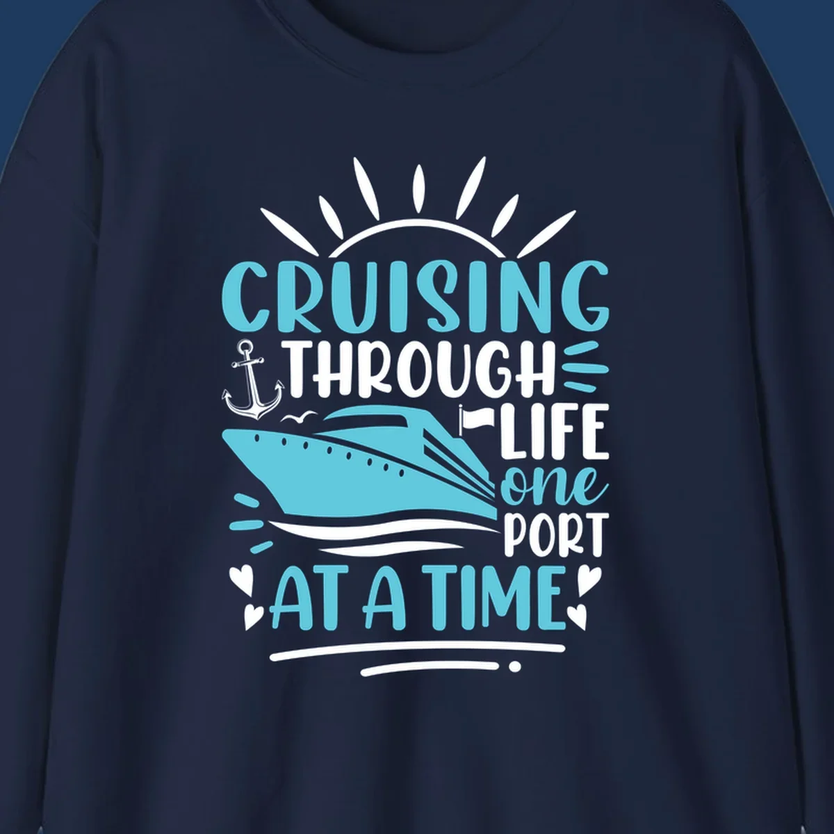 Cruise ship with anchor and sun rays design featuring text 'Cruising Through Life One Port At A Time' in turquoise and white on gray background