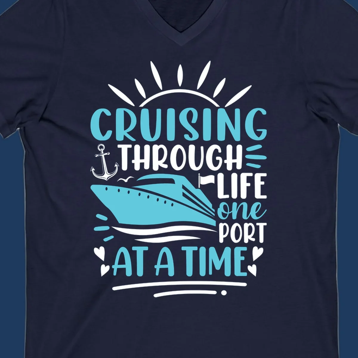 Cruise ship with anchor and sun rays design featuring text 'Cruising Through Life One Port At A Time' in turquoise and white on gray background