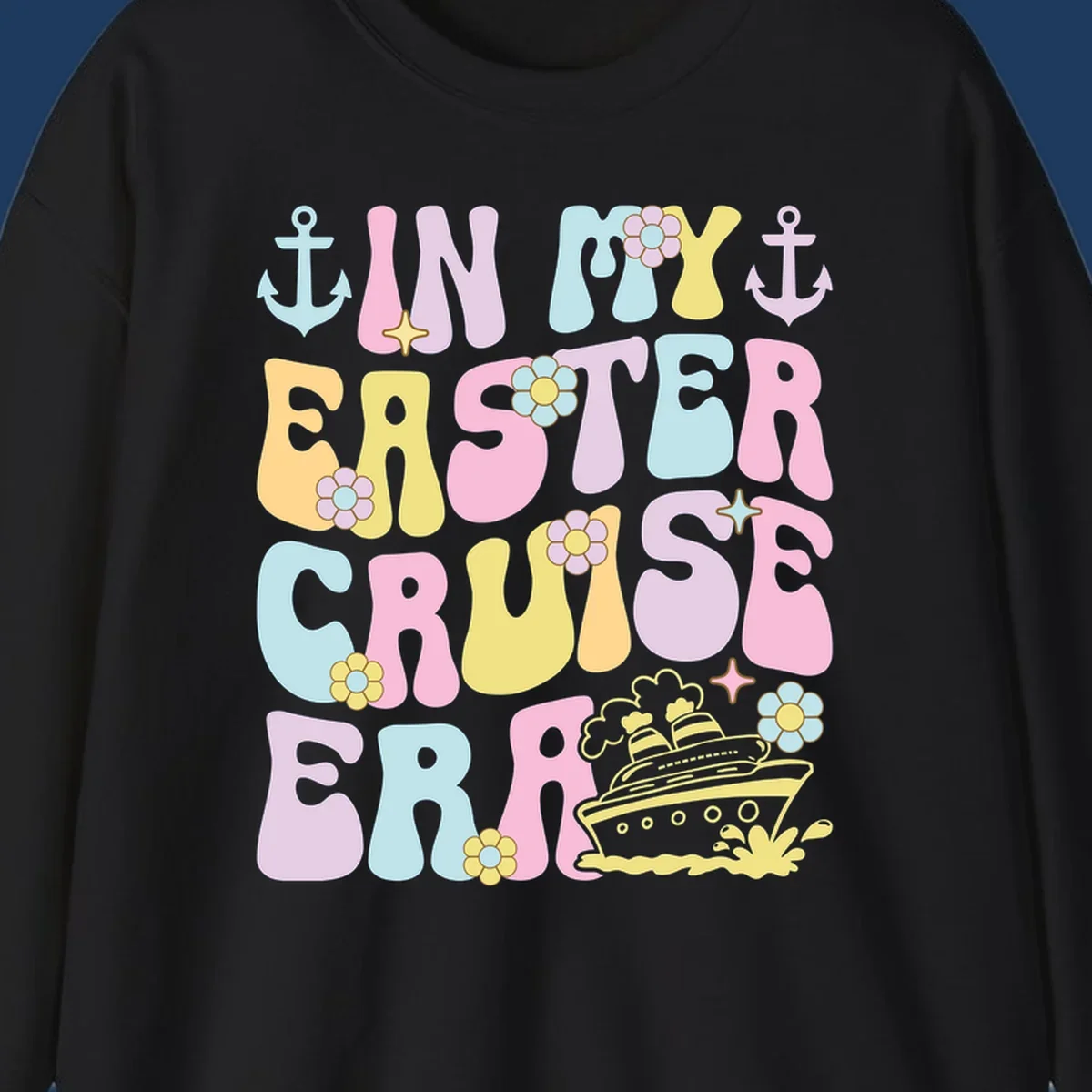 Colorful illustrated text reading 'IN MY CRUISE ERA' with nautical anchors, flowers, stars, and a cruise ship graphic on gray background