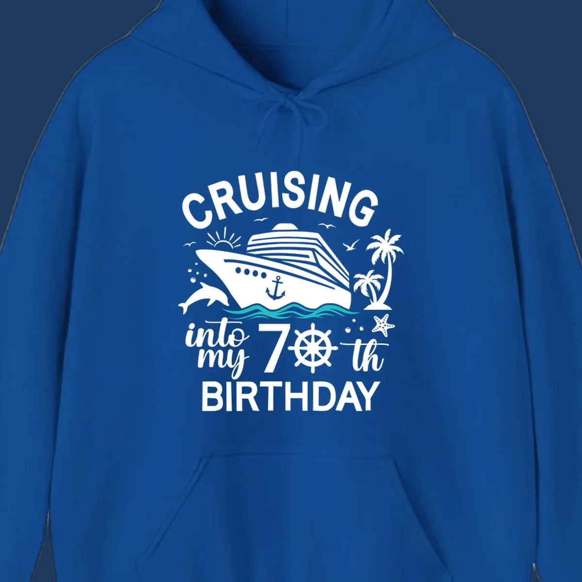 Cruise ship illustration with 'Cruising into my 70th Birthday' text, featuring dolphins, palm trees, starfish, and nautical elements on gray background