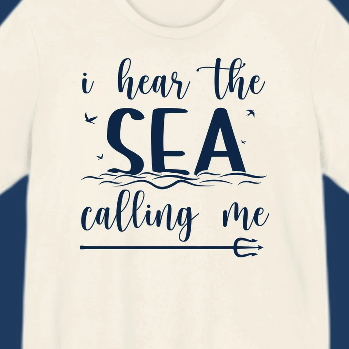 White nautical design with 'i hear the SEA calling me' text, ocean waves, seabirds, and trident anchor on gray background