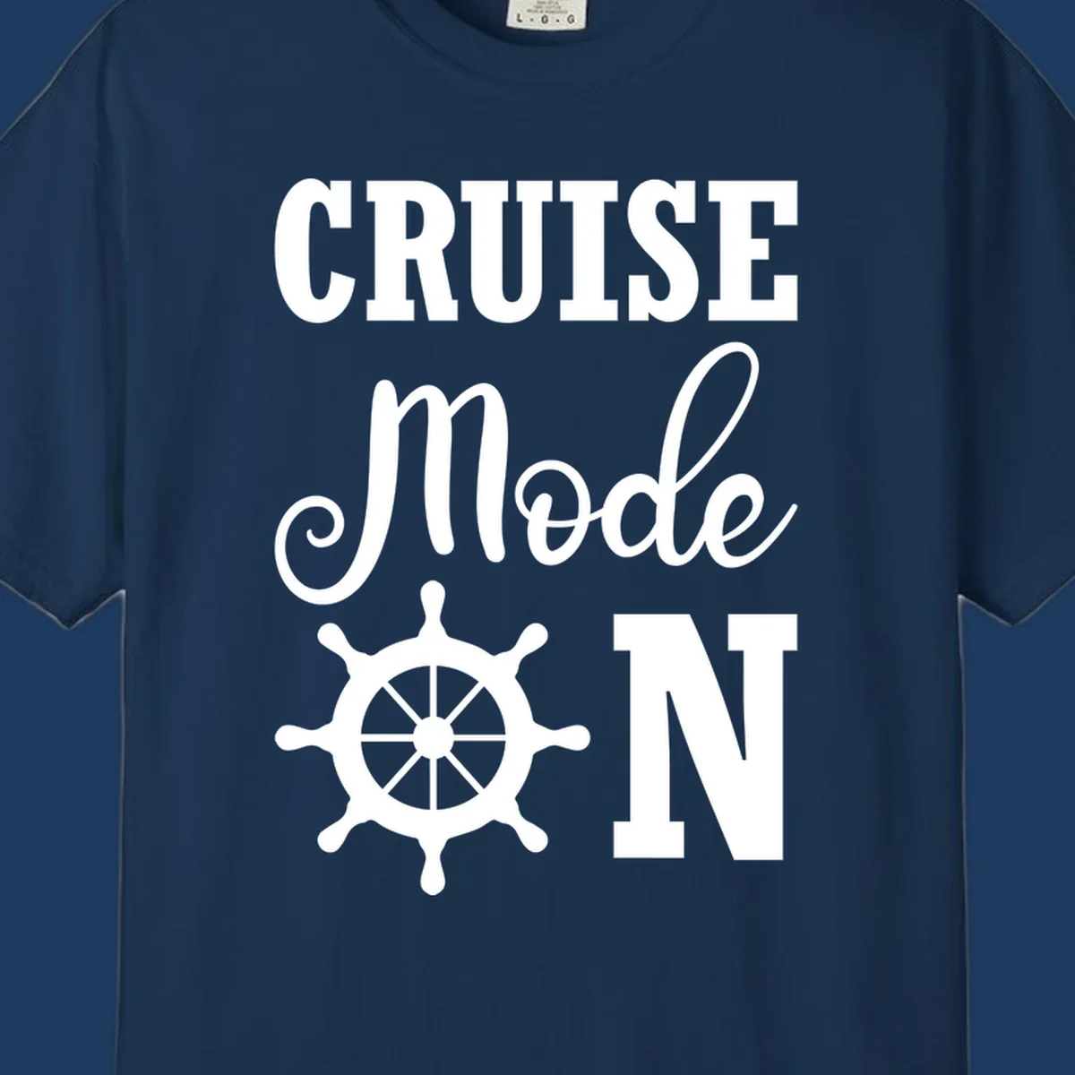 White ship wheel with cruise mode text design on gray background for nautical vacation apparel
