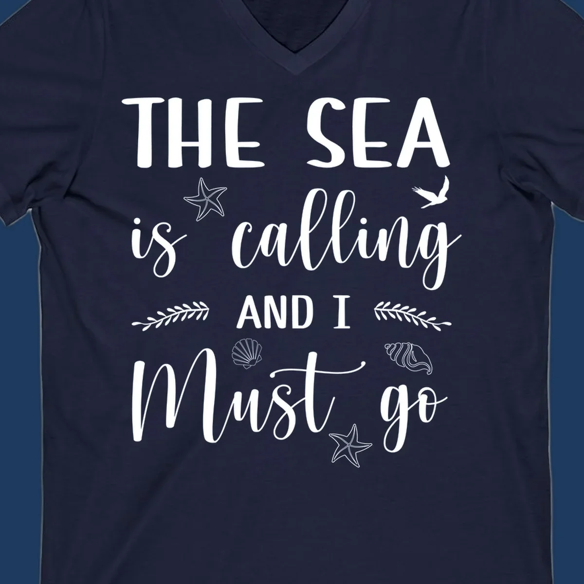 Gray design with white text reading 'The Sea is calling and I must go' surrounded by starfish, seashells, seaweed, and seabird illustrations