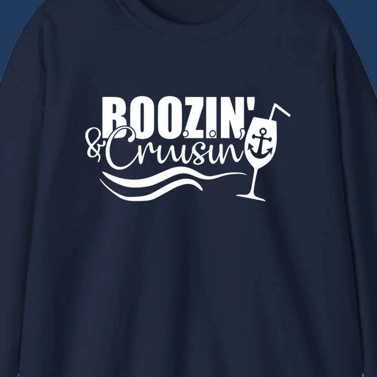 Boozin' & Cruising nautical design with anchor, wine glass, and ocean waves on gray background