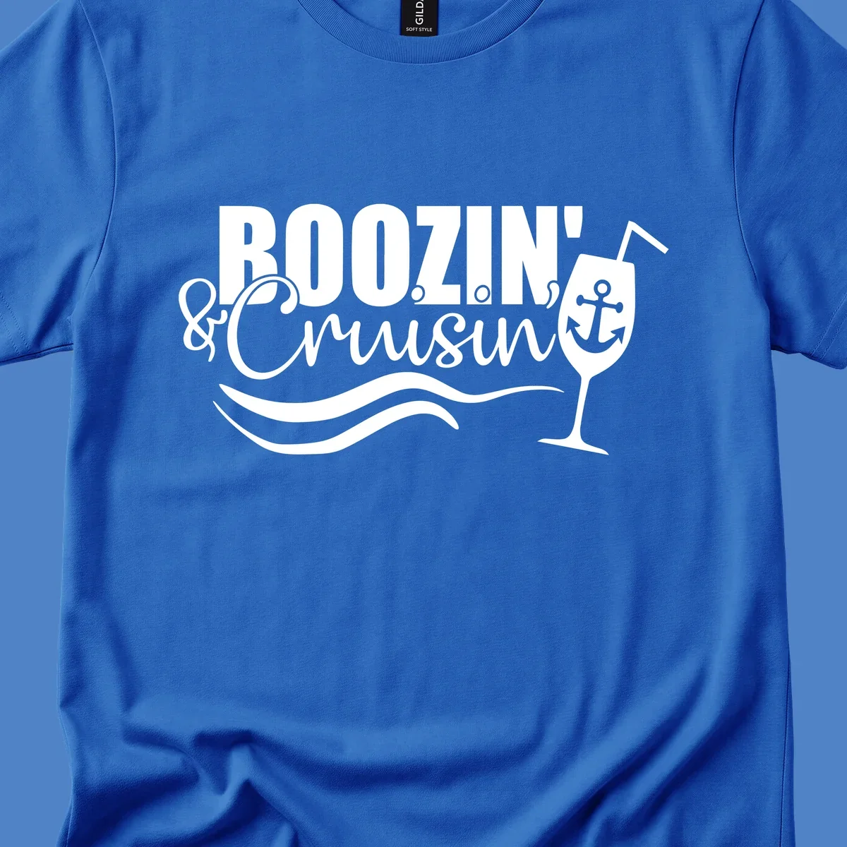 Boozin' & Cruising nautical design with anchor, wine glass, and ocean waves on gray background
