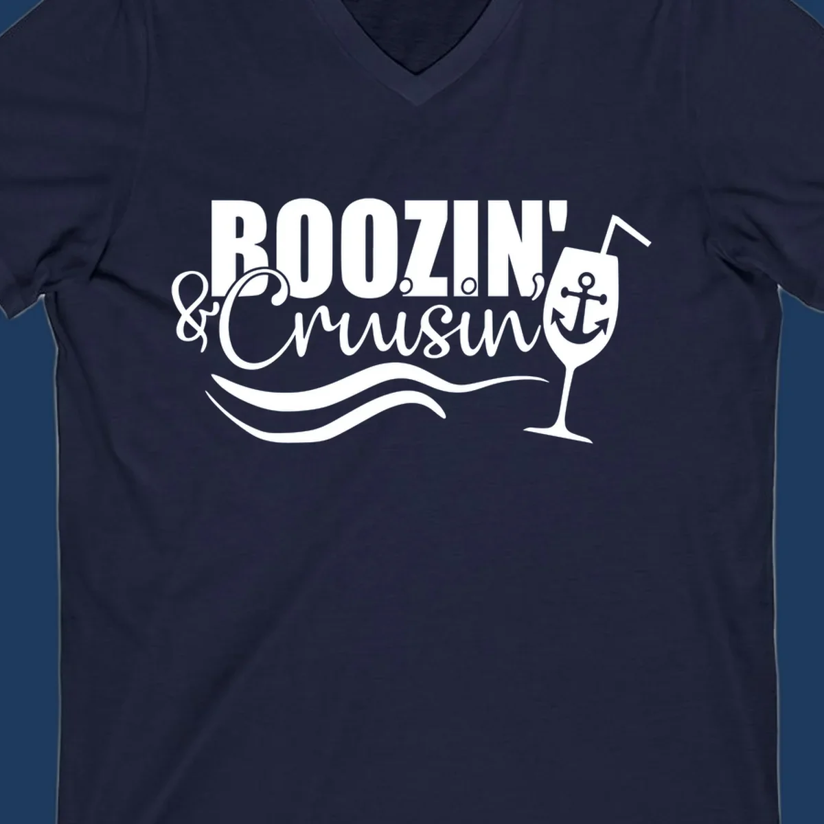 Boozin' & Cruising nautical design with anchor, wine glass, and ocean waves on gray background