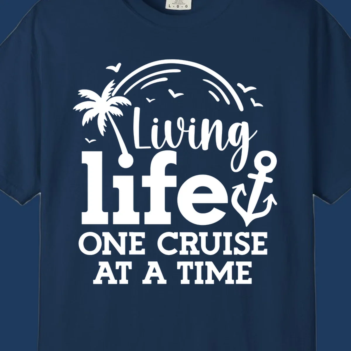 White tropical design with palm tree, anchor, rainbow and seagulls surrounding text 'Living life ONE CRUISE AT A TIME' on gray background