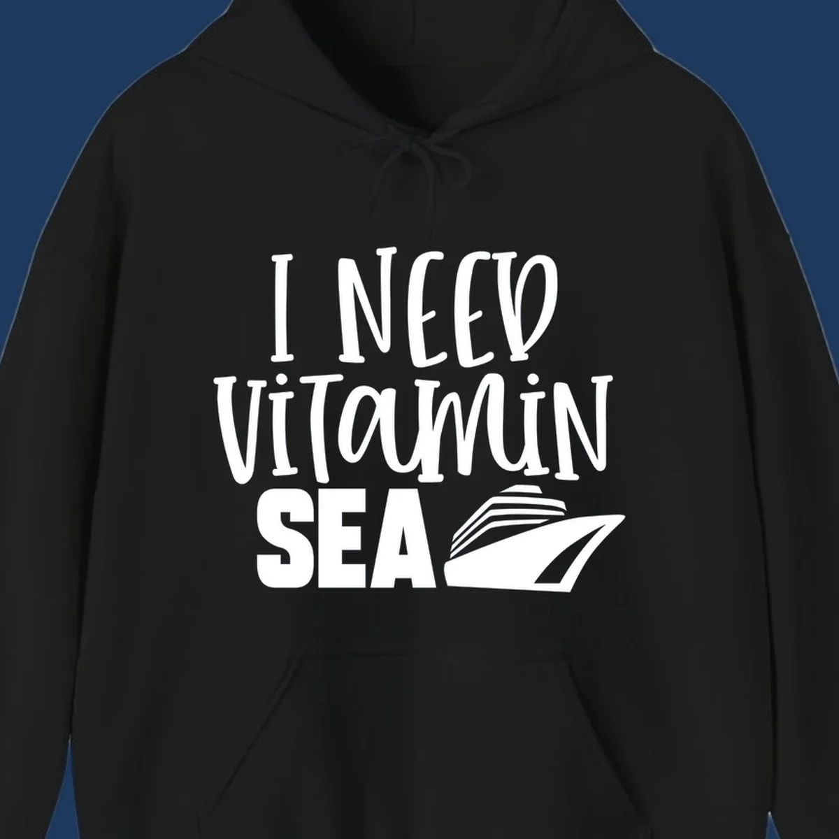 White text reading 'I Need Vitamin Sea' with a stylized cruise ship illustration on gray background