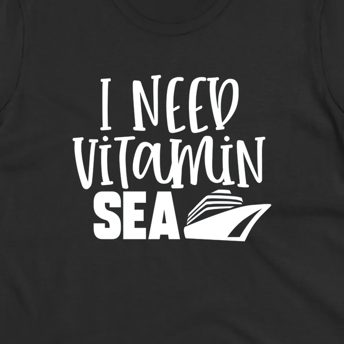 White text reading 'I Need Vitamin Sea' with a stylized cruise ship illustration on gray background