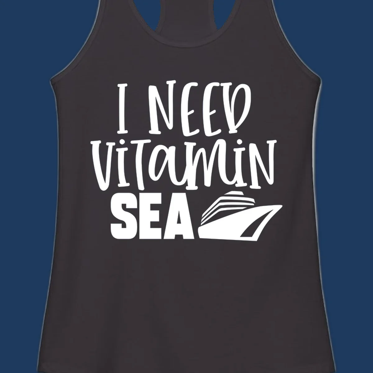 White text reading 'I Need Vitamin Sea' with a stylized cruise ship illustration on gray background
