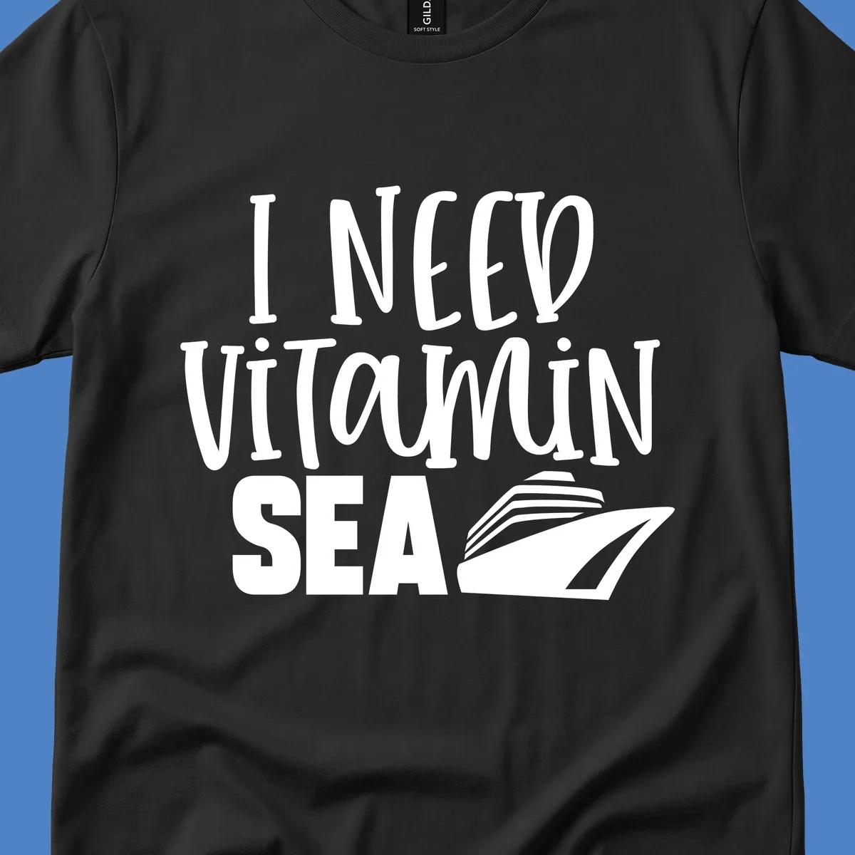 White text reading 'I Need Vitamin Sea' with a stylized cruise ship illustration on gray background