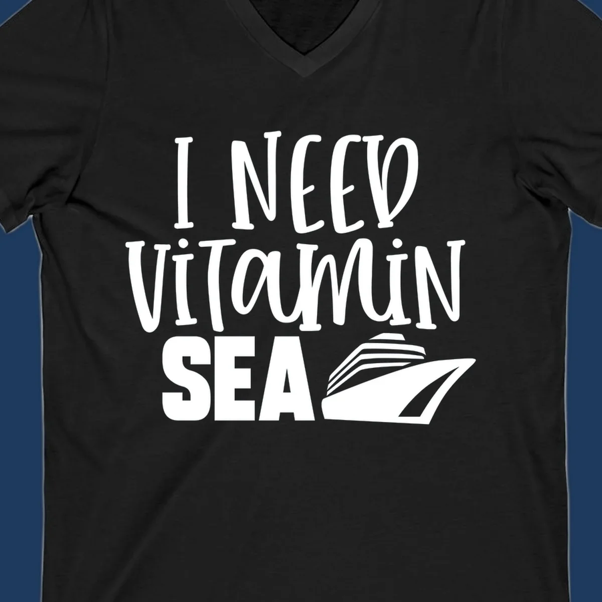 White text reading 'I Need Vitamin Sea' with a stylized cruise ship illustration on gray background