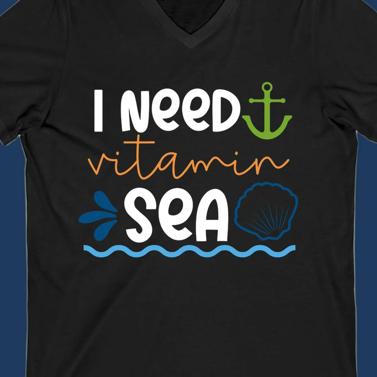 Nautical design with white text reading 'I Need Vitamin Sea' surrounded by anchor, shells, waves, and water droplets in orange, green, and blue