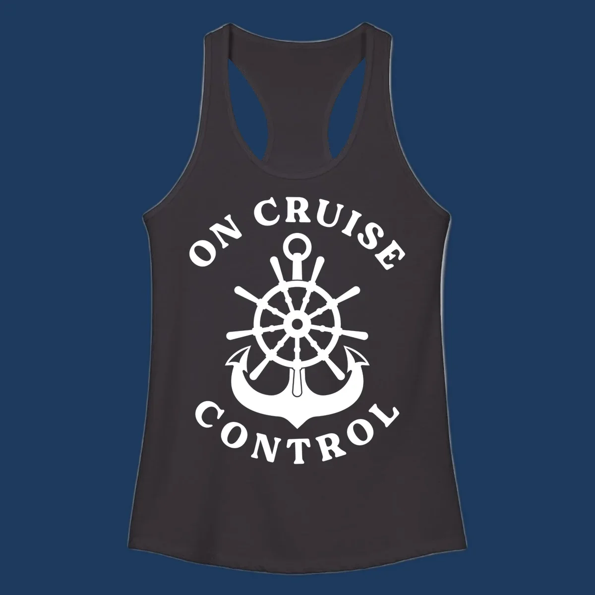 On cruise control nautical badge with ship wheel, anchors, crown and shield design in white on gray background.