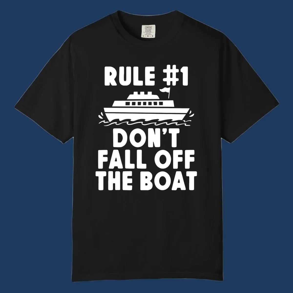 Humorous cruise design with ship illustration and text reading 'Rule #1 Don't Fall Off The Boat' on gray background