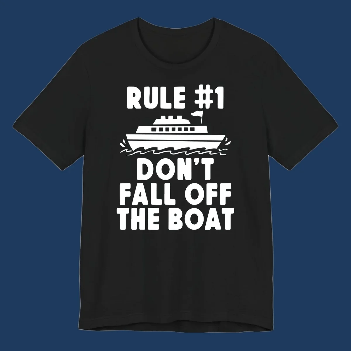 Humorous cruise design with ship illustration and text reading 'Rule #1 Don't Fall Off The Boat' on gray background