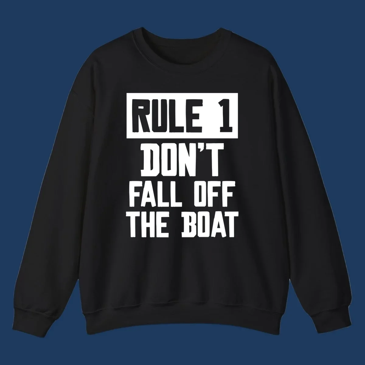 Bold gray and white typography reading 'Rule 1 Don't Fall Off The Boat' - a humorous nautical design