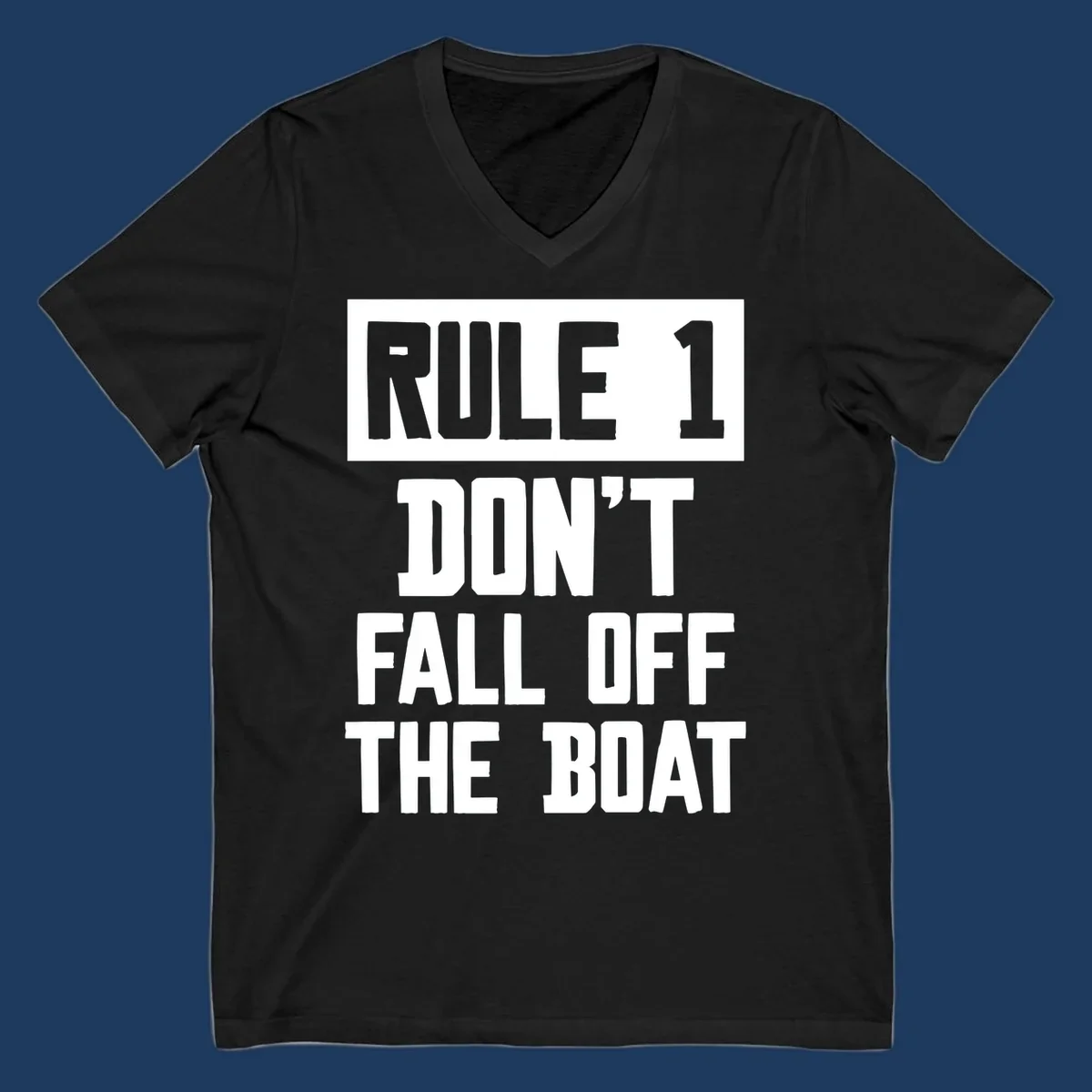 Bold gray and white typography reading 'Rule 1 Don't Fall Off The Boat' - a humorous nautical design